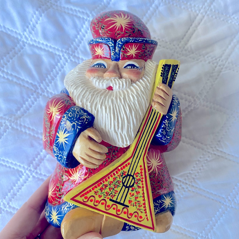 Hand-Painted Red and Blue Holiday Santa Figurine with Balalaika